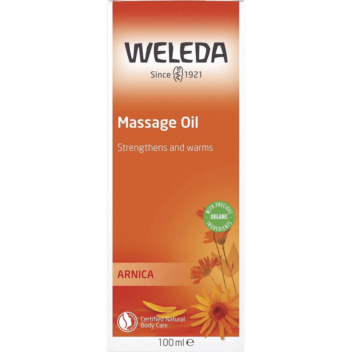 Front view of a Weleda Arnica Massage Oil box with a dark green design and floral illustrations.