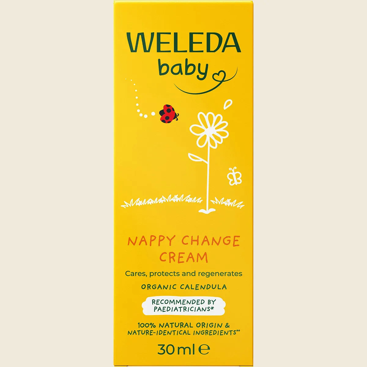 Weleda baby nappy change cream packaging on a beige background