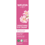 Pink box of Weleda Smoothing Eye Cream with Wild Rose & White Tea on a white background.