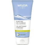 Weleda purifying gel cleanser tube on a beige background