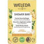 Weleda Ginger and Petitgrain Shower Bar 75g in a green and white box with illustrations of ginger and orange leaves.