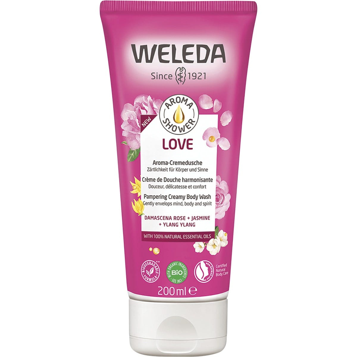 Weleda Aroma Shower Love 200ml tube featuring rose, jasmine, and ylang-ylang floral illustrations on a pink label.