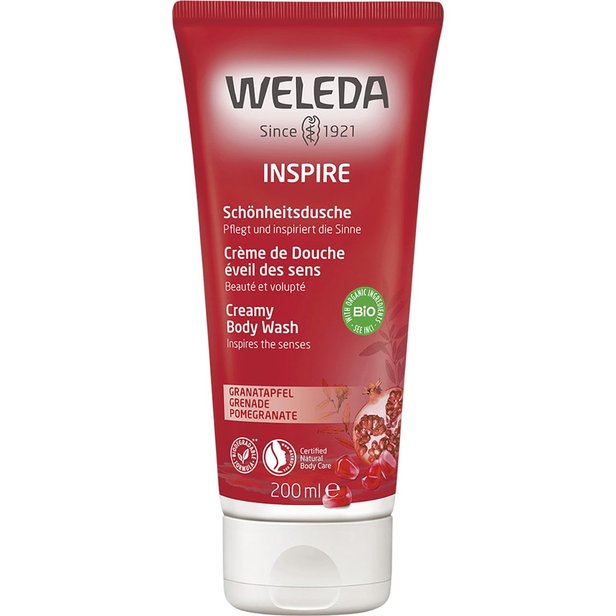 200ml tube of Weleda Pomegranate Inspire Creamy Body Wash with botanical illustrations on a white background.