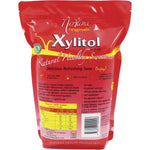 Back of Nirvana Originals Xylitol 2kg pouch with nutrition facts, ingredients, and storage instructions.