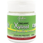 Nirvana Organics 200g refillable shaker of certified organic xylitol with a green and white label.