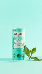 Weleda Eucalyptus-Peppermint deodorant stick in a green and white cardboard tube on a white background.