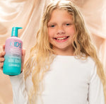 Giovanni Eco Chic Kids 2-in-1 Shampoo and Conditioner bottle with watermelon and strawberry illustrations.