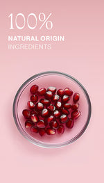 Pomegranate seeds and petals with listed ingredients for Weleda Inspire Shower Cream on a white background.