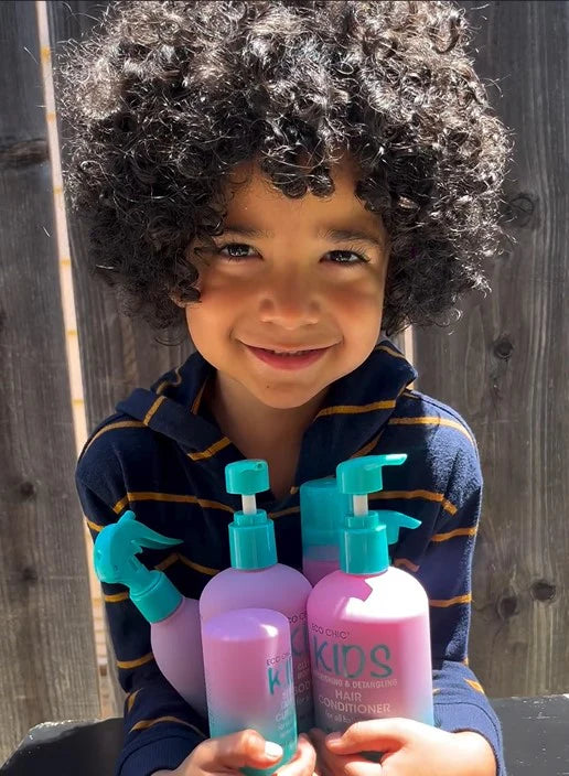 Giovanni Eco Chic Kids collection featuring various haircare and body wash bottles with fruit illustrations.