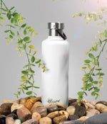White 600ml Cheeki insulated water bottle with a silver screw-top lid and carry handle on a white background.